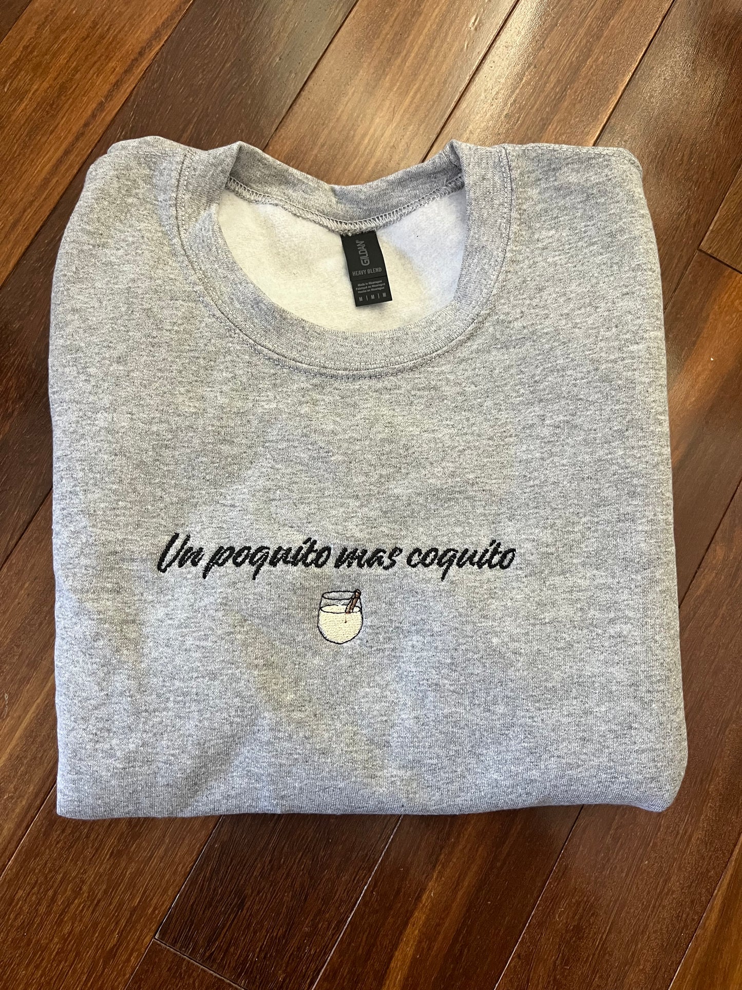 Un Poquito Mas Coquito Embroidered Holiday Crewneck Sweatshirt