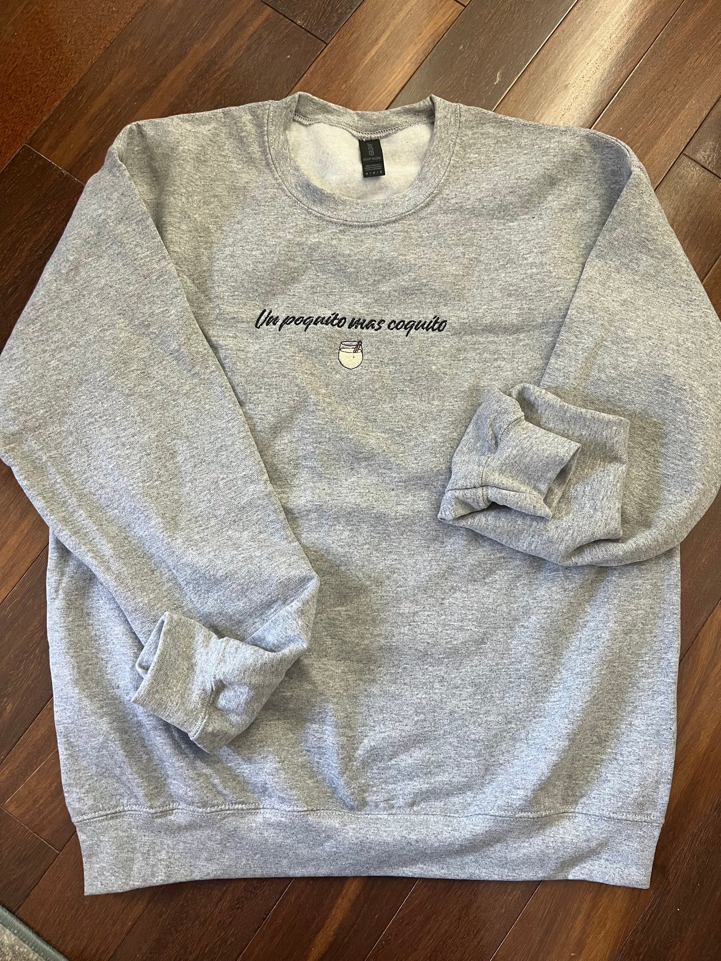 Un Poquito Mas Coquito Embroidered Holiday Crewneck Sweatshirt